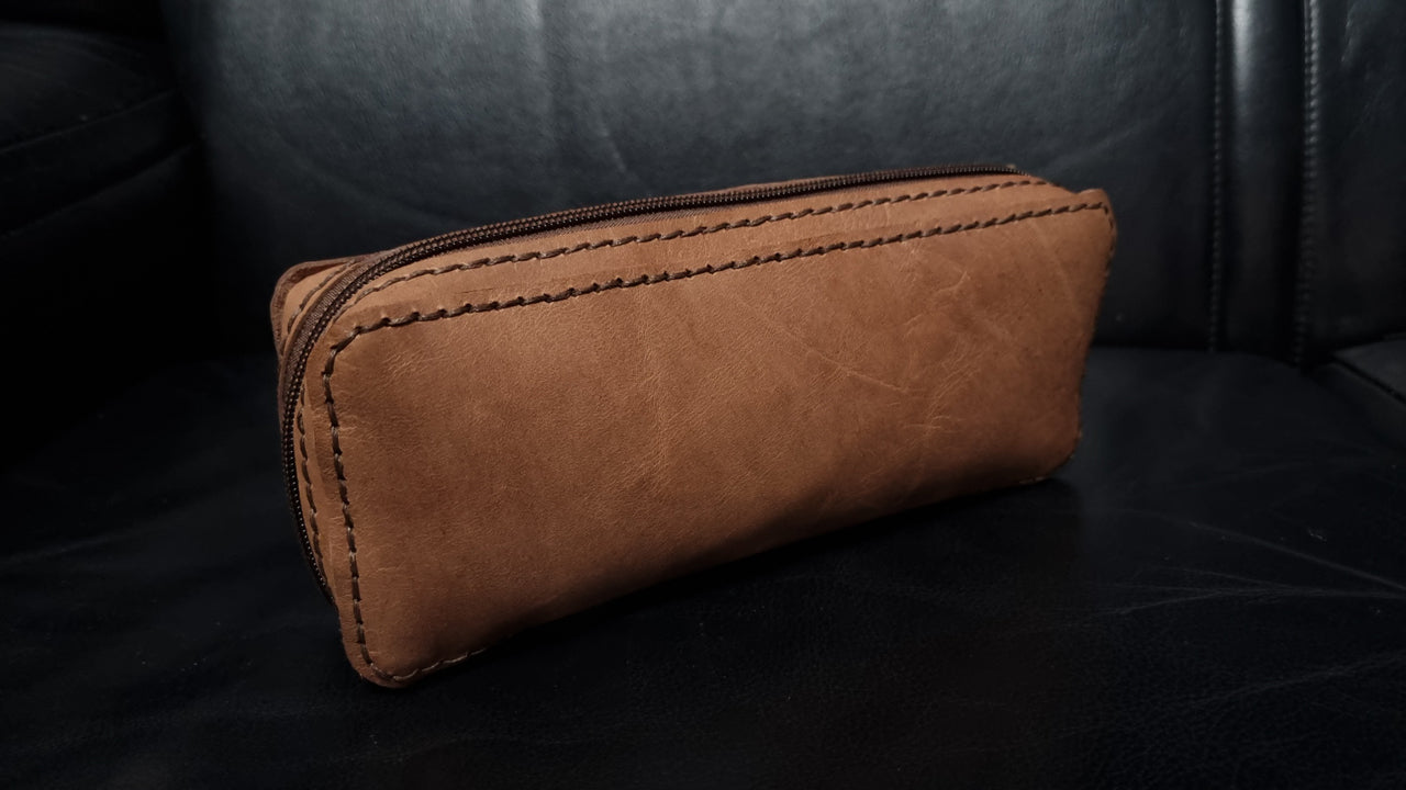 Load video: Making a Small Leather Zip Pouch